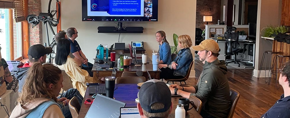 Blemd staff attending a presentation from Well 365.
